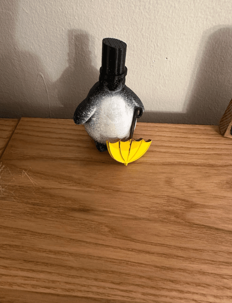 Fat Penguin & Yellow Umbrella