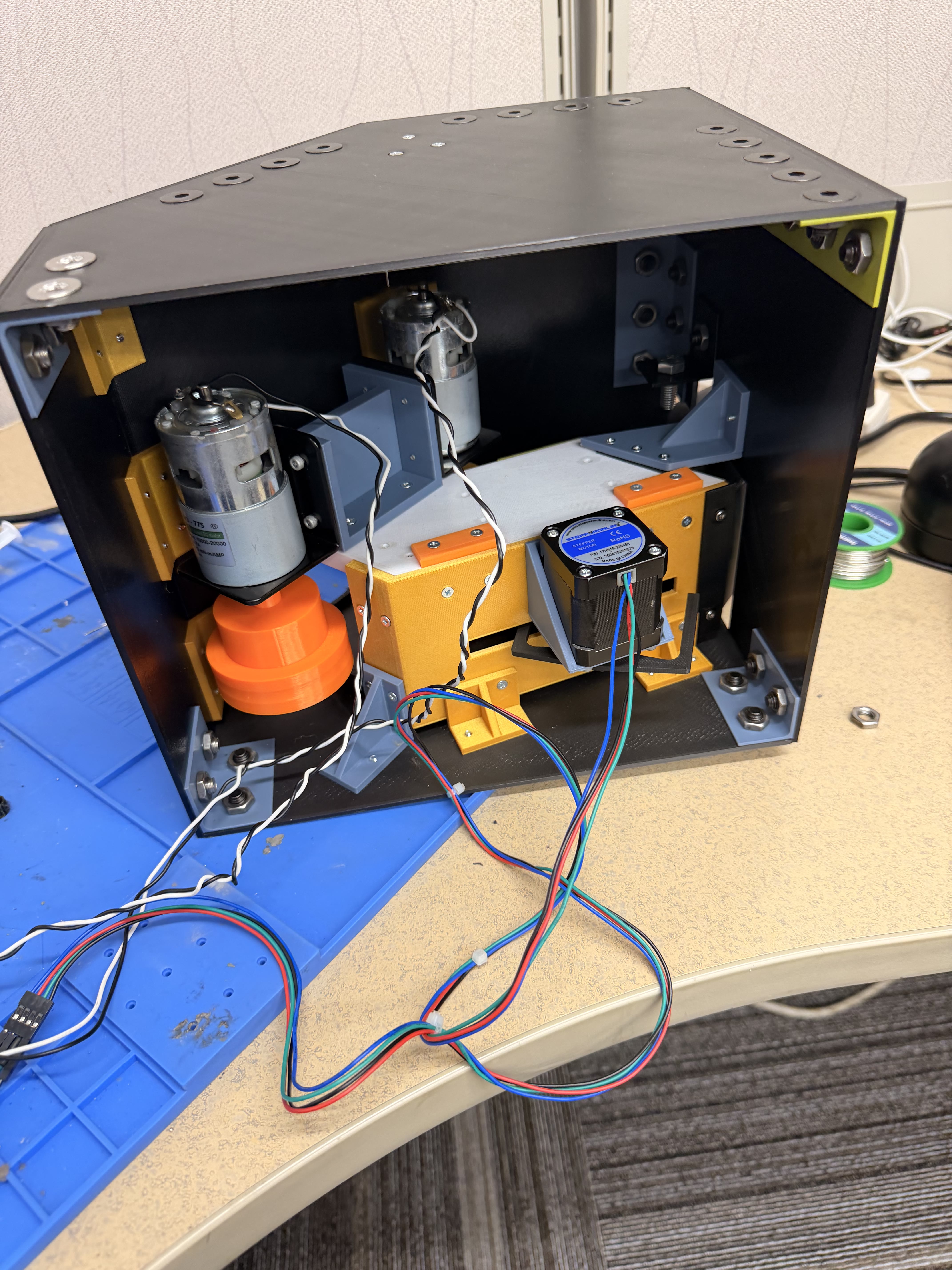 Open chassis with dual RS-775 flywheels and NEMA 17 stepper